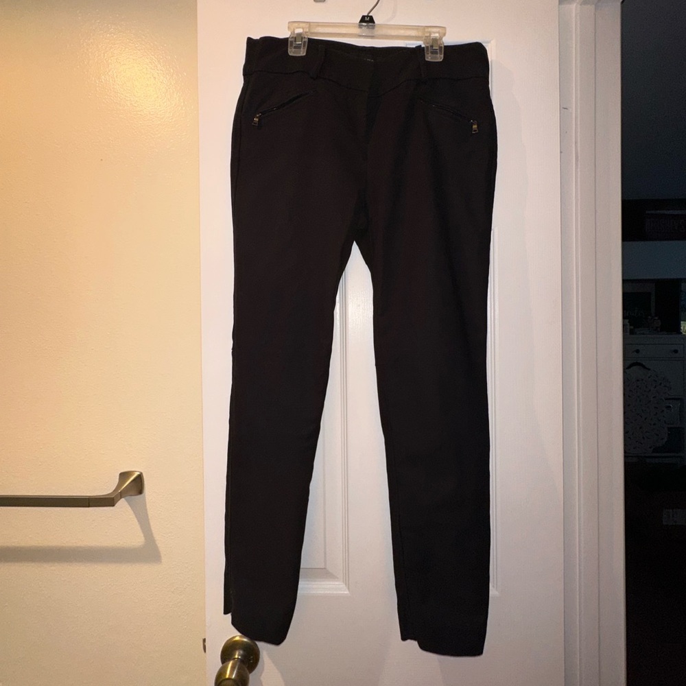 Black slacks and with zipper pocket